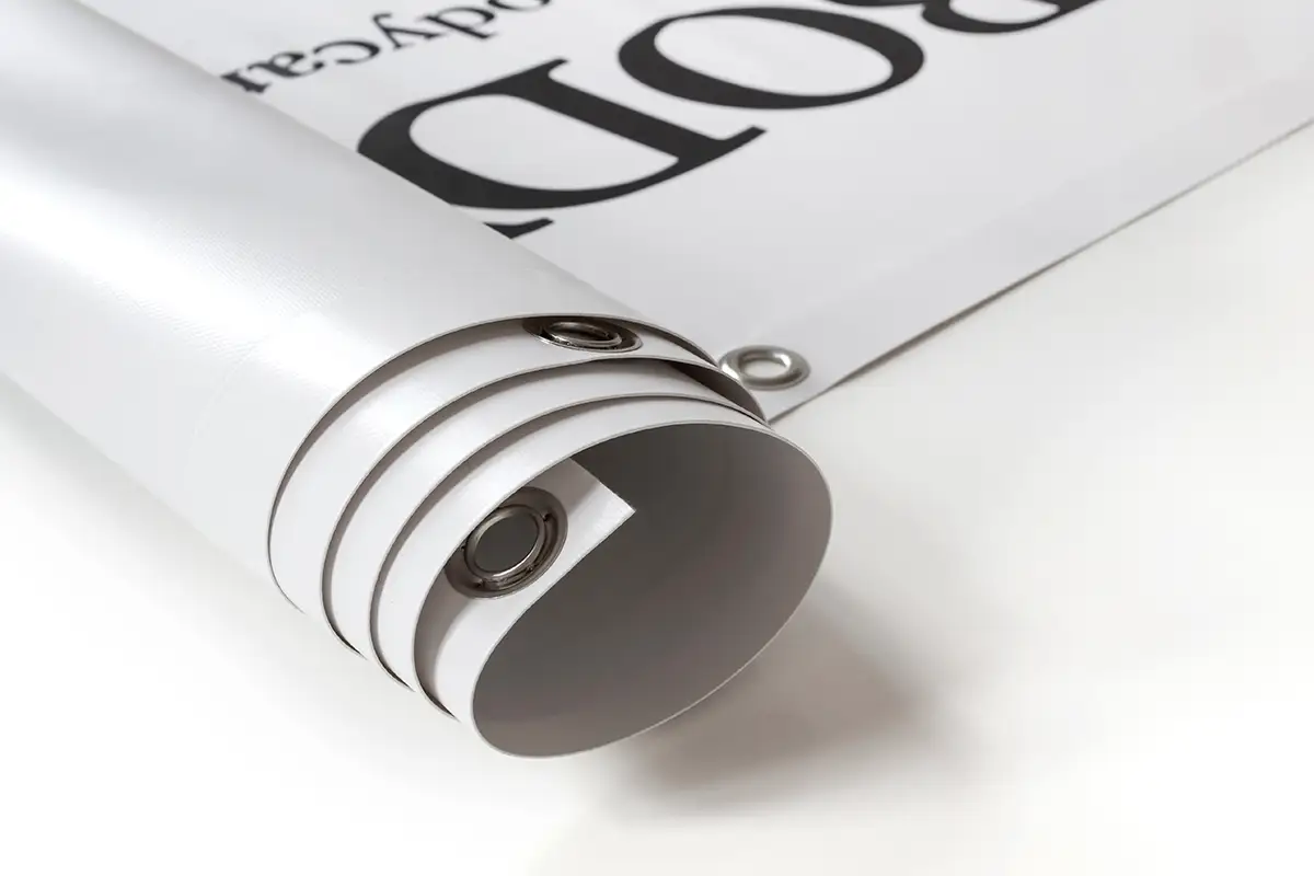 High quality outdoor printed PVC banner, rolled with metal eyelets.